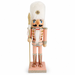 Rose gold soldier nutcracker in pink and white, with fur hat and gold spear