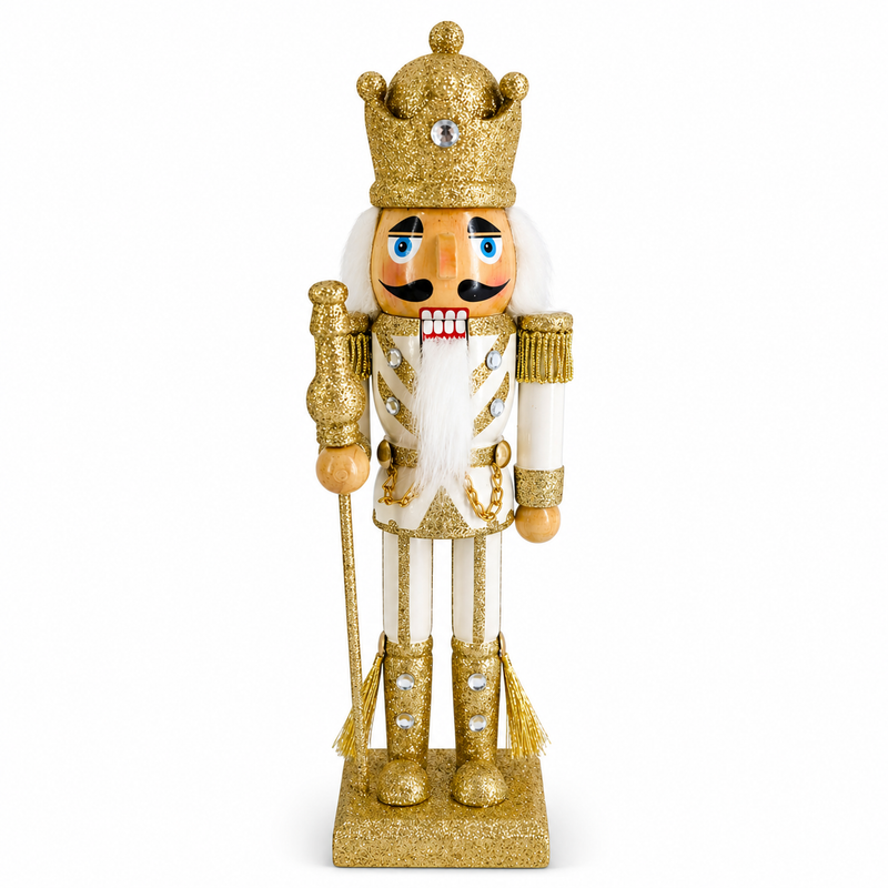 King nutcracker figure in gold and ivory, with jeweled crown and glitter scepter