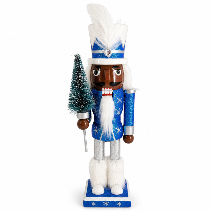 African American Snow Fantasy king nutcracker figure in blue glitter and silver, holding a bottle brush tree