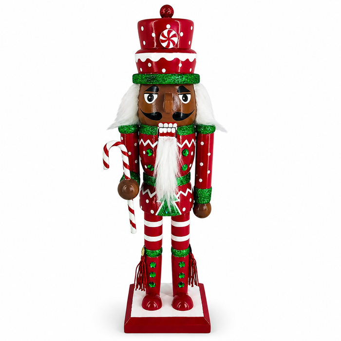 African American candy cane nutcracker in red and green, with peppermint hat and candy cane staff