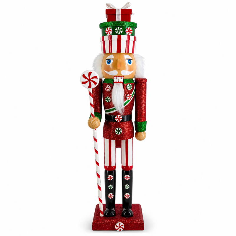 Peppermint soldier nutcracker figure in red and green, wearing a stacked gift-box hat and holding a candy cane staff