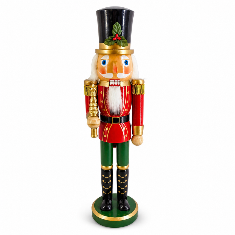 Classic soldier nutcracker figure in red and green, holding a molded gold tree